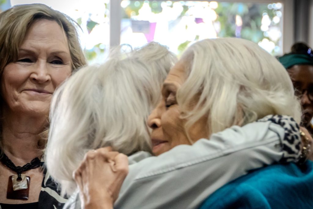 Pastor Bushrod embraces another church member at Generations Church