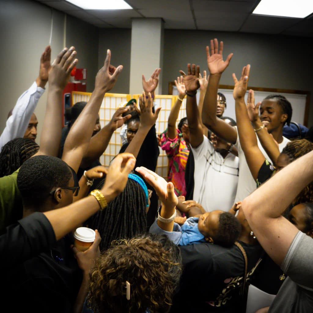G-Squad volunteers at a morning huddle at Generations Church